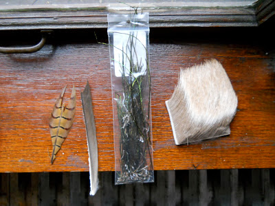 Various feathers, elk hair for fly tying