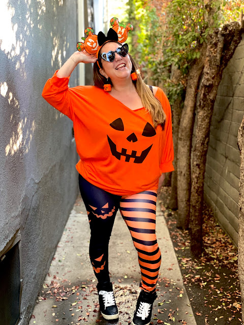 Jamie Allison Sanders is showing off her Halloween Spooky Season looks in a pumpkin outfit.