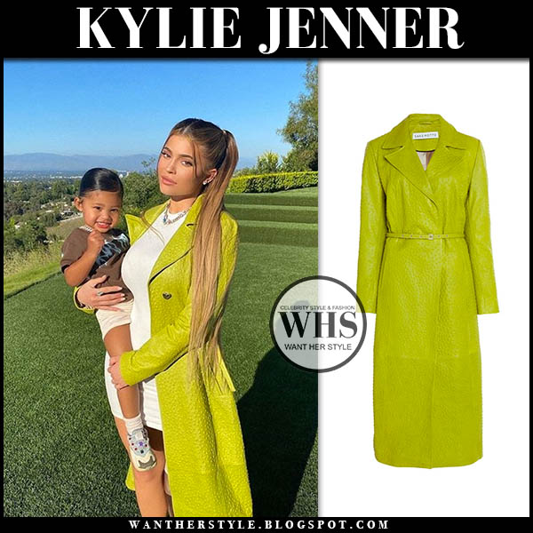 Kylie Jenner in green leather coat and white mini dress