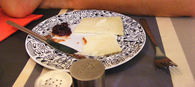 Local sheeps milk cheese and black cherry jam at a restaurant in Saint Jean de Luz, Pyrenees-Atlantiques, France. Photo by Loire Valley Time Travel.