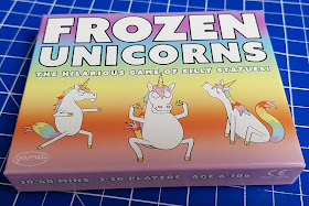 Frozen Unicorns Family and Party Game box cover showing dancing illustrated unicorns