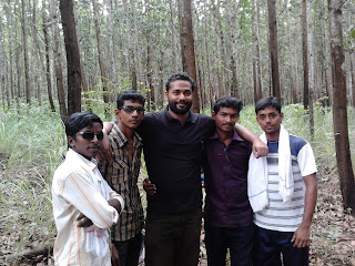 Photos at Vazhvanthol Waterfalls by Siju George