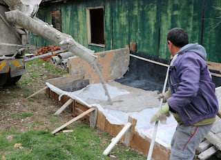 Pouring the mix out into the prepared area