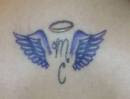 miley cyrus wings tattoo