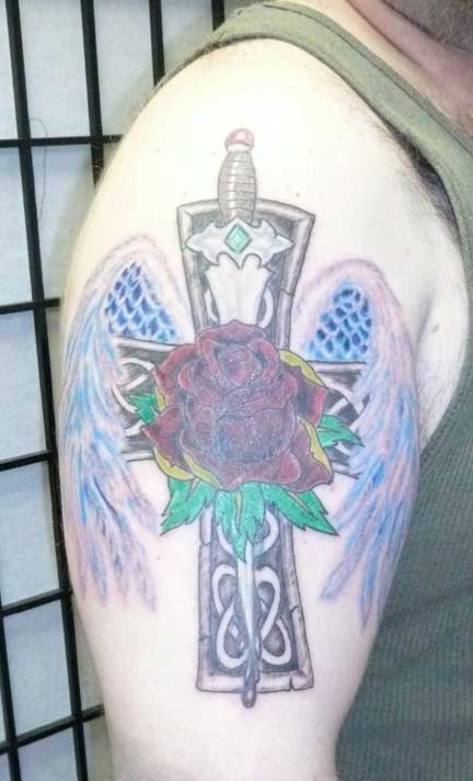 Posted in cover up tattoo tattoo cover up winged cross Leave a reply