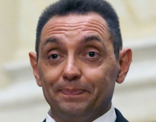 Aleksandar Vulin making an effort to laugh