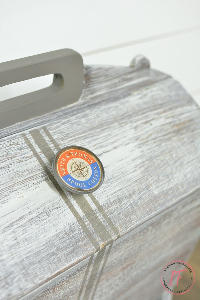 Vintage sewing box stand makeover with vintage-style Smith & Thomas Spool Cotton furniture knobs.