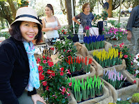 Audre Teo in a Bucket Straw Hat