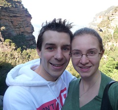 Us at the top of the waterfall, obscuring the lovely view behind us