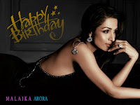 malaika arora birthday, she lying on belly with modern jewelry, pendant, ear rings and finger ring