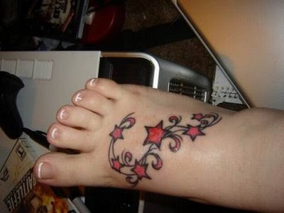 Five star tattoo designs weared on the front of woman's neck. Foot tattoo 