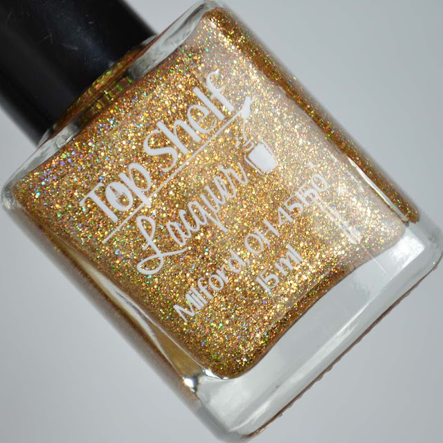 holo gold nail polish in a bottle