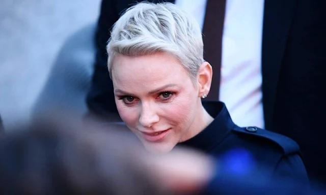 Princess Charlene wore an outfit, dark blue jacket and trouser, from Akris' new spring-summer 2023 collection