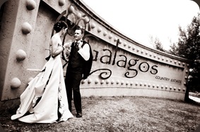 Bride and groom in fron of Galagos entrance - Joretha Taljaard Wedding Photography