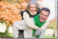 stock-photo-6691673-senior-man-giving-woman-piggyback-ride