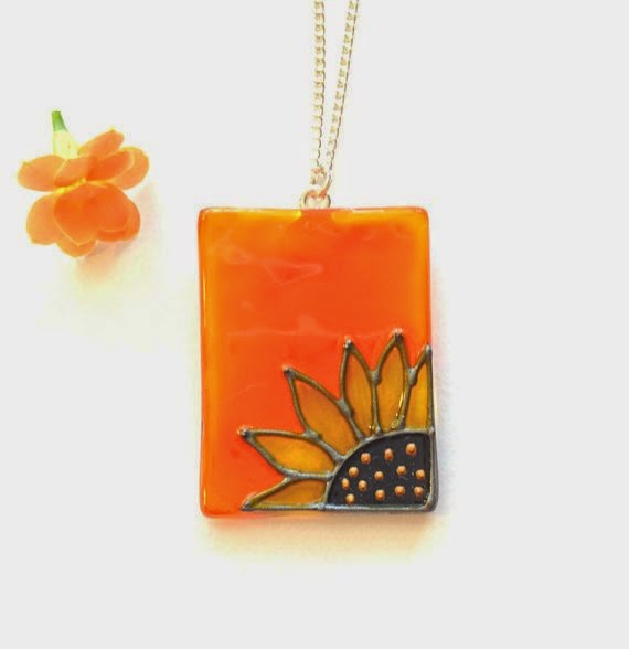 https://www.etsy.com/listing/196845220/glass-pendant-in-orange-with-a-sunflower?ref=favs_view_10