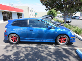 Civic with peeling paint and key scratches before paint at Almost Everything Auto Body