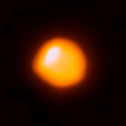 Through the eyes of ALMA: Atacama Large Millimeter Array, Betelgeuse appears as a blazing orange blob