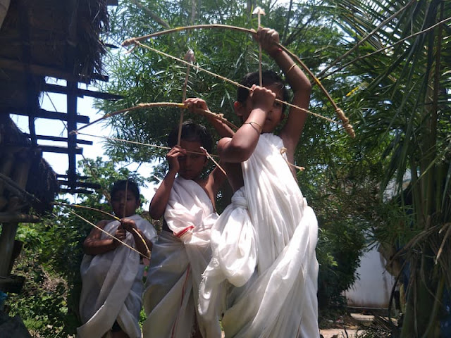 Children Playing Ramayana in India with Bamboo Bows