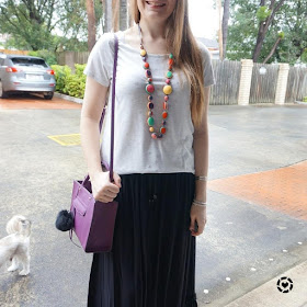 awayfromtheblue Instagram | star foil print tee with statement necklace black maxi skirt colourful accessories, SAHM style