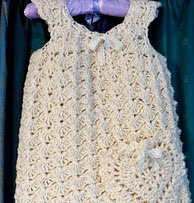 http://www.ravelry.com/patterns/library/12m-24m-little-white-dress