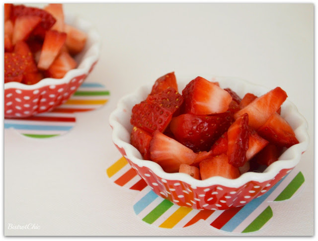 Paper lining the food trays and dishes at a party from BistrotChic