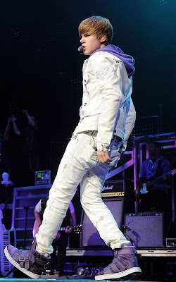 Justin Bieber performing at the American Airlines Arena and out with Selena Gomez