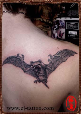 a bat tattoo design on the back