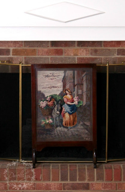 Needlepoint fireplace screen.