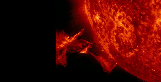 A solar eruption on Sept. 26, 2014, seen by NASA's Solar Dynamics Observatory. If erupted solar material reaches Earth, it can deplete the electrons in the upper atmosphere in some locations while adding electrons in others, disrupting communications either way. Credit: NASA