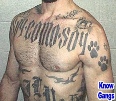 Bulldog paw tats on a Fresno gang member If it were orange I'd say he was