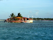 Happy Island off our bow. Ashore at the Anchorage Yacht Club, Angelo told me . (happyisland)