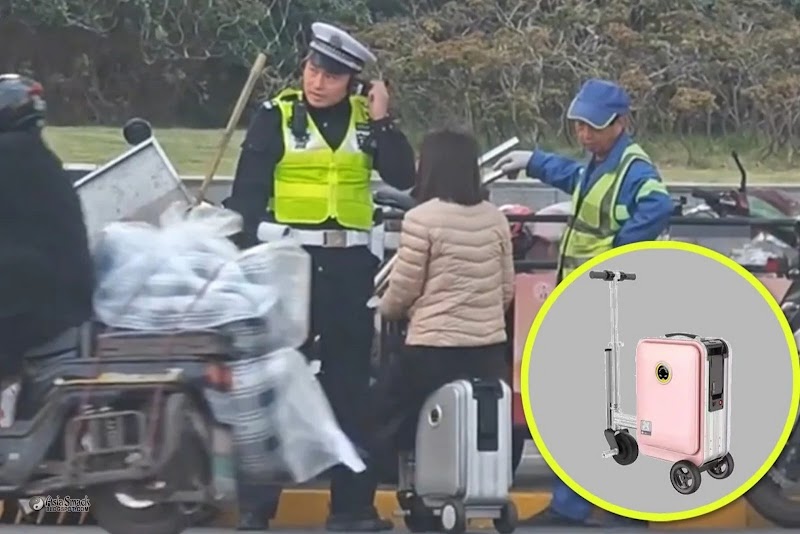 Chinese Women Ride Electric Bags And Fined