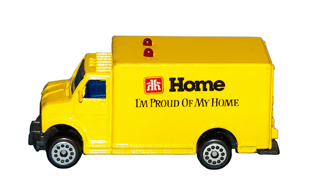 Miniature delivery van from Home Hardware with flashing lights.