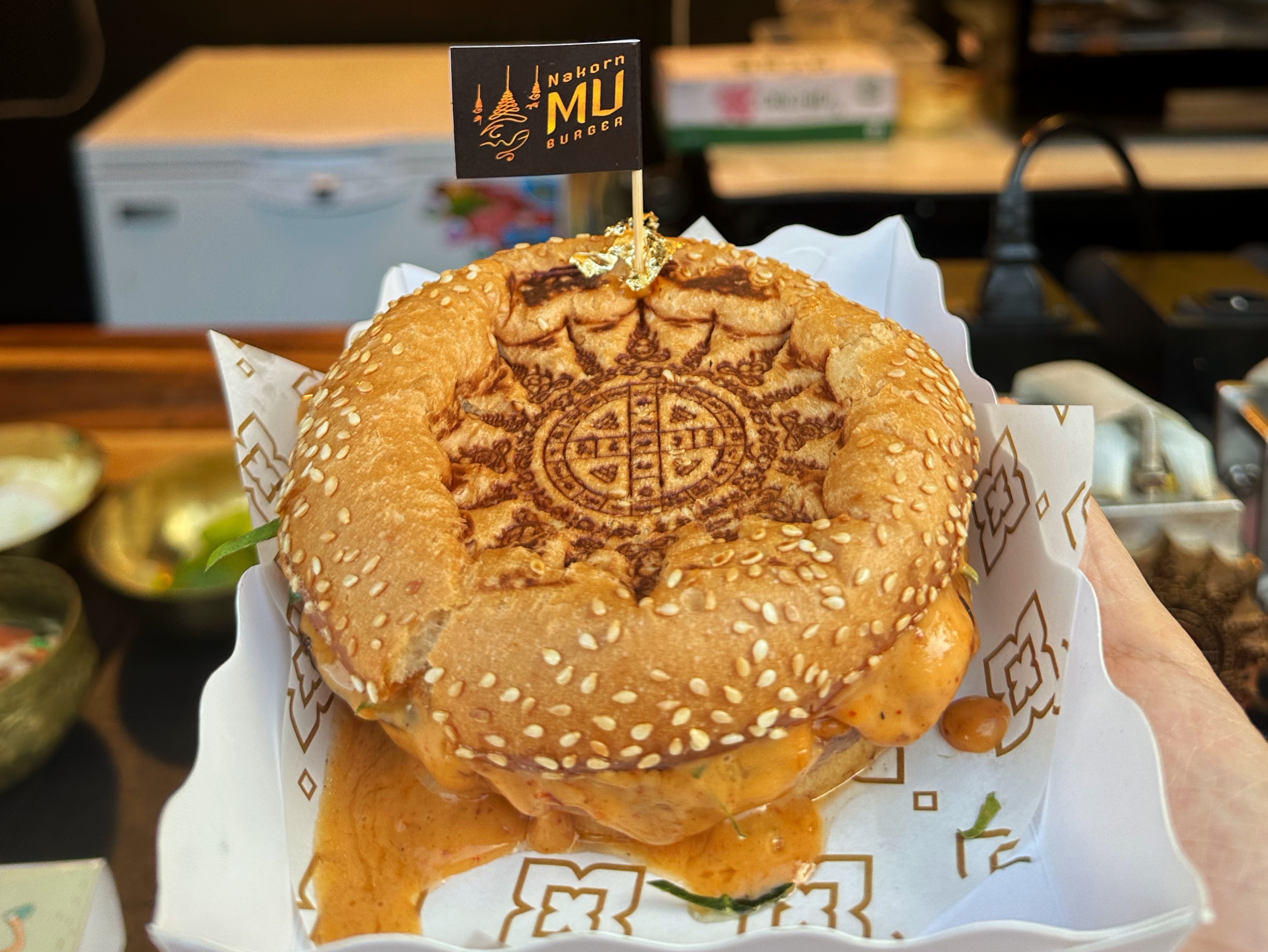 Thailand holy tattoo burger (tom yum gai chicken burger) in Bangkok, Thailand