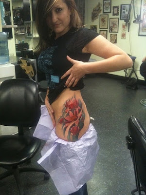 tattoos for girls on hip flowers. flowers tattoos for girls.