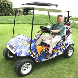 golf cart in purple coleor with nice hot flames on the side of it
