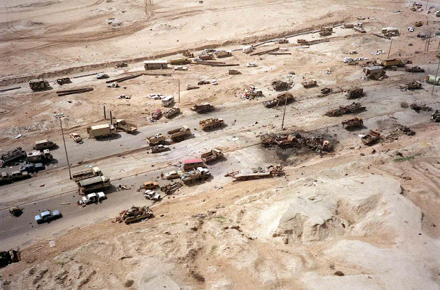 Civilian and Iraqi military vehicles litter a section of the highway attacked by Allied aircraft during Operation Desert Storm.