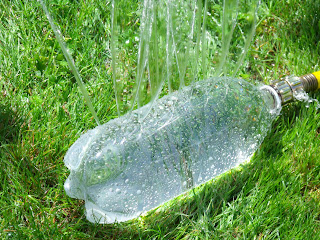 http://www.clevercraftycookinmama.com/2012/07/make-your-own-sprinkler-kid-craft.html#.U-9rqaPw-8k