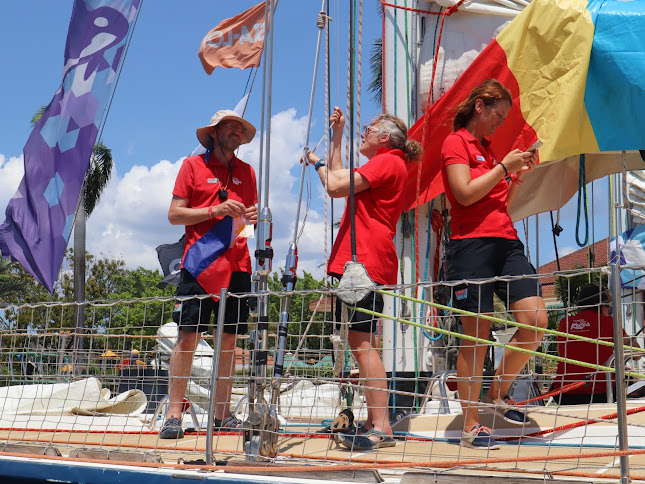 Crew members of a competing yacht prepare for the send-off ceremony as the leave Subic Bay to restart the Clipper Race 2019-20.