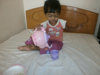 Playing with her X mas gift