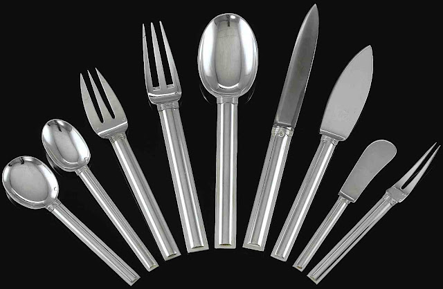 a 1928 Jean E. Puiforcat dining silverwear design in a radiating arrangement