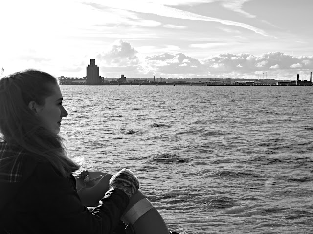 girl overlooking the mersey river