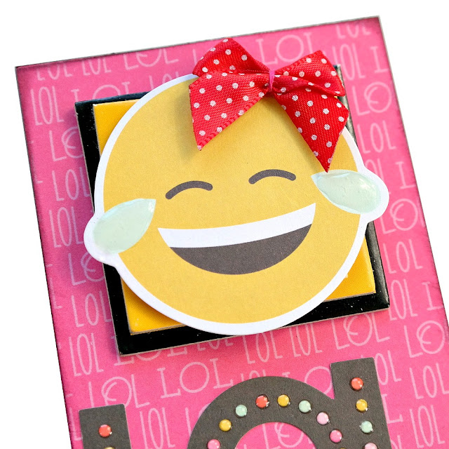 Laughing Emoji Face Embellishment with Red Polka Dot Bow and Liquid Glass Tears