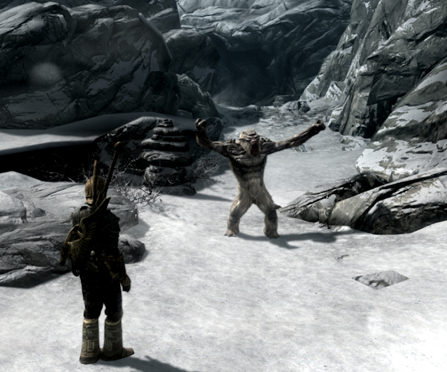 Frost troll growling at the hero on a snowy path