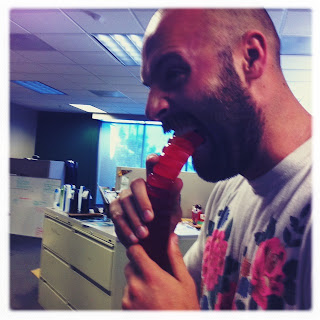 Thomas VanMelum eating a giant gummy worm