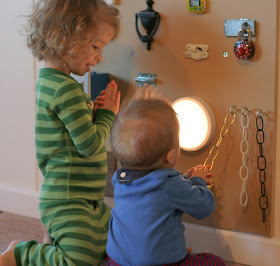 Three different DIY sensory boards along with ideas for how to include older siblings from Fun at Home with Kids