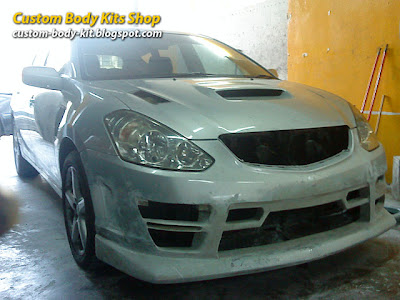 Toyota Caldina Body Kit in progress - front bumper body kit side view