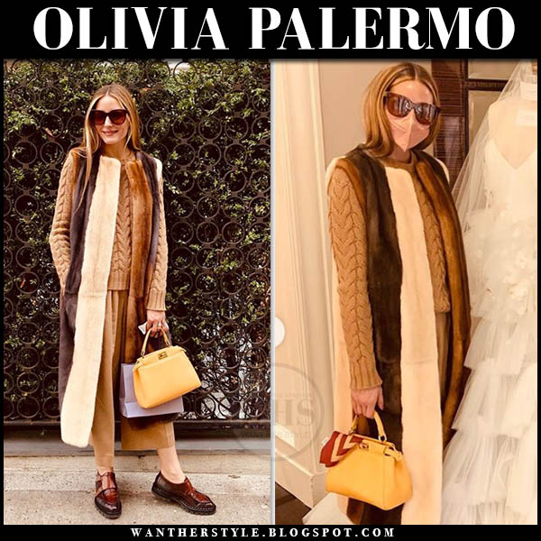 Olivia Palermo in striped fur sleeveless coat and camel sweater