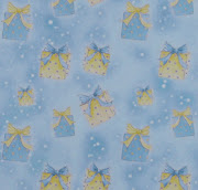 Here's a close up of the yellow and blue presents on the page. (sheet of background paper )